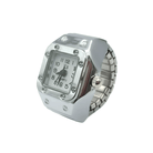 a silver square ring watch on a white background