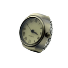 image of a ring watch on a while background