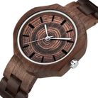 upclose image of a wooden wrist watch on a white background